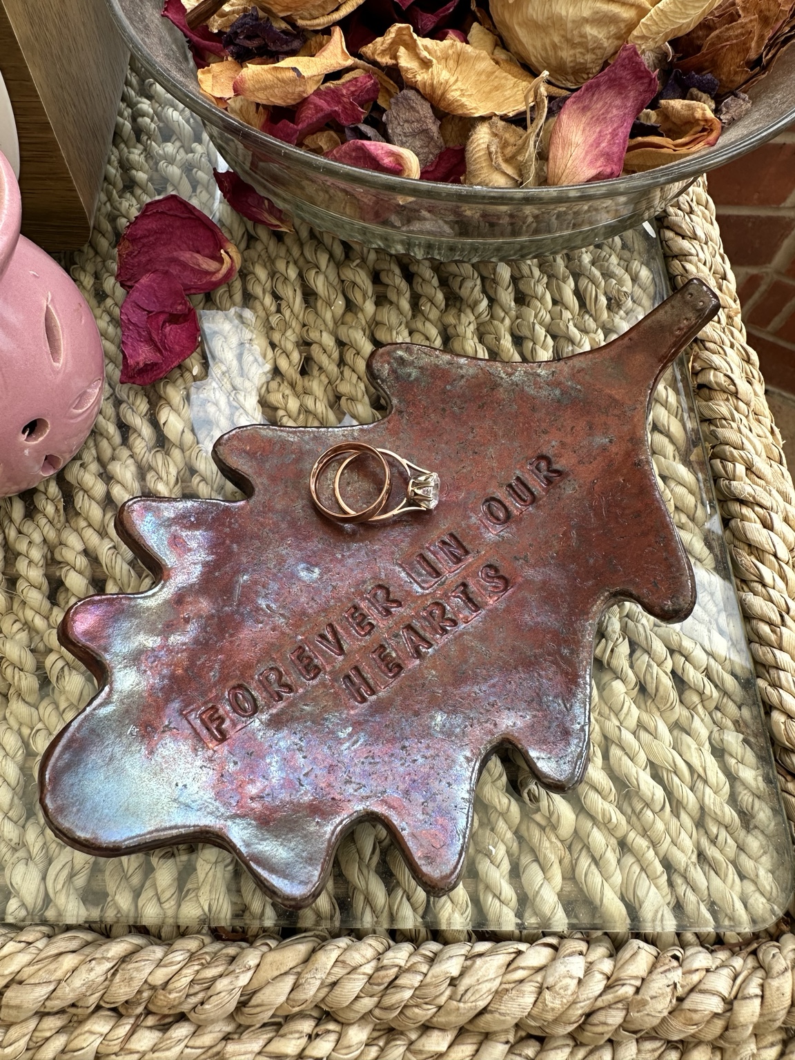 Commissioned copper Raku oak leaf stamped Forever in our hearts, holding two rings